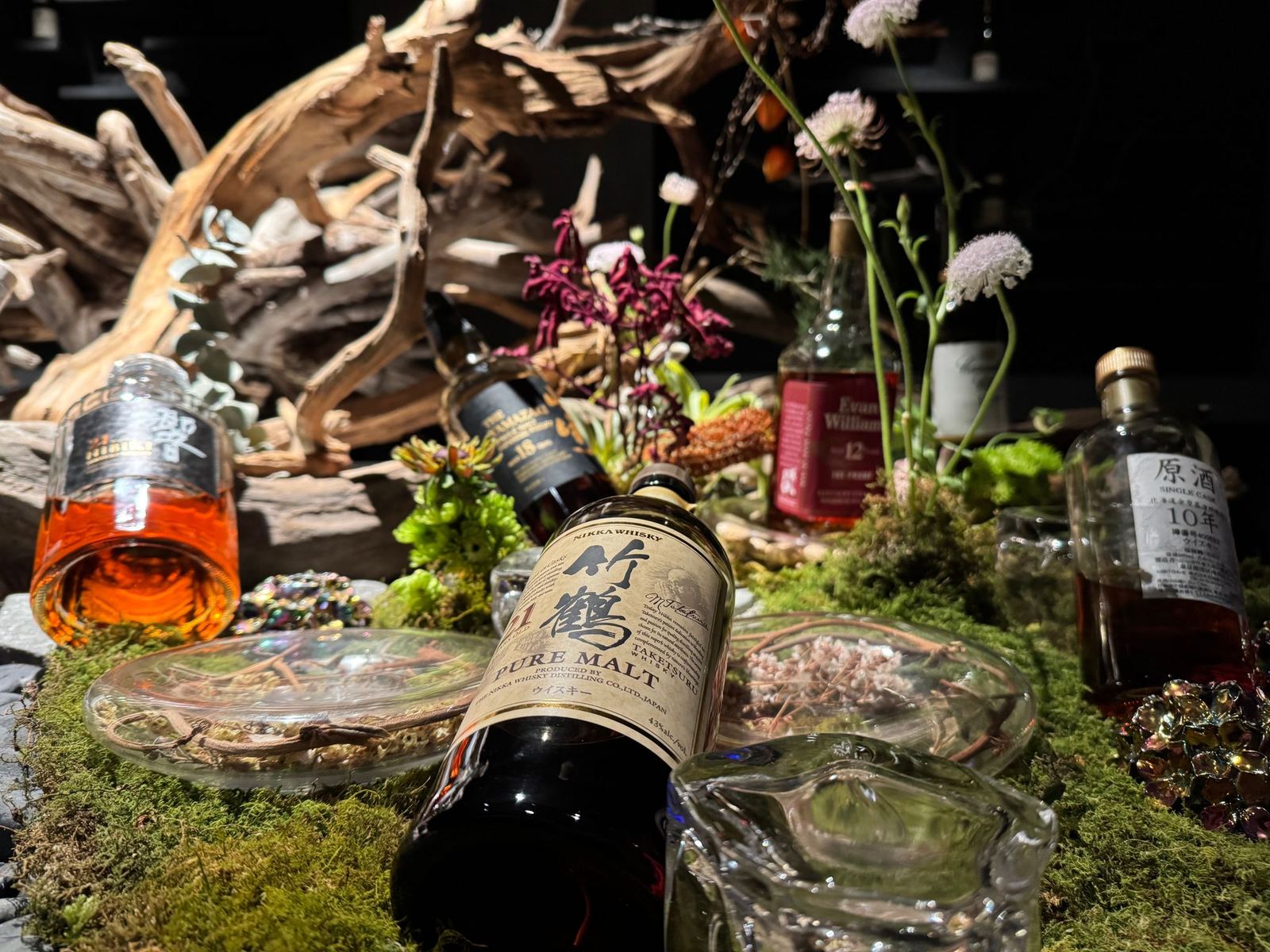 Glasses of Japanese whisky lined up for a guided tasting in Aoyama
